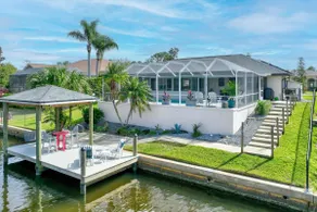 Waterfront Home with Pool,  Hot Tub, Dock, Game Room & 10 minutes to the Beach - Image 2