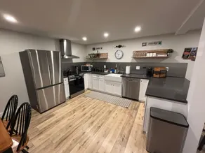 Renovated 2‑Bed Apt w/EV Charger Close to Village - Image 2