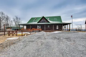 Spacious Howard Cabin with Wraparound Deck and Views - Image 3