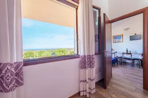 Casa Lentischio Apartment with Sea View, Shared Pool, Terrace, and Wi-Fi - Image 4