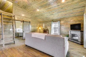 Cozy Mississippi Cabin w/ Covered Porch & Grill! - Image 4