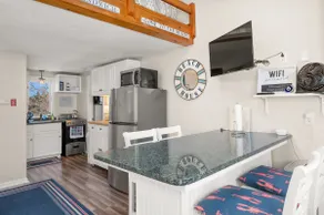 Charmant appartement en copropriété convivial et familial avec barbecue | Vue plage | À côté de la plage - Image 4