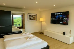 Alpine panorama: modern apartment with mountain views - Image 3