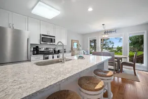 Newly listed bluff villa with creek and golf views - Image 2