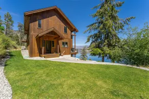 Lakeside retreat with panoramic views - Image 2