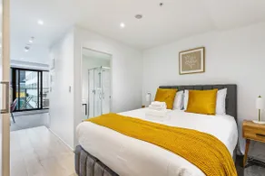 Stylish Modern Unit w Balcony and Pool Zodiak Stays - Image 4