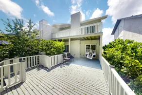 Two-story 3BR waterfront retreat with a deck - Image 2