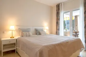 Chic 2BR with Sunlit Terrace | 5-Pools | Garage - Image 4