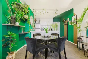 Serene botanical oasis with city views and sunroom - Image 2