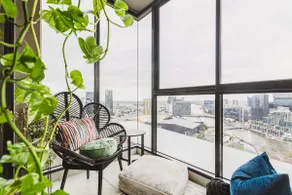 Serene botanical oasis with city views and sunroom - Image 4