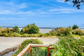 1BR oceanfront getaway with patio and deck - Image 4