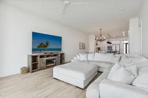 Sleek Coastal Condo with Stunning Riverfront Views and Luxury Amenities - Image 4