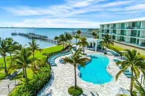 Sleek Coastal Condo with Stunning Riverfront Views and Luxury Amenities - Image 2