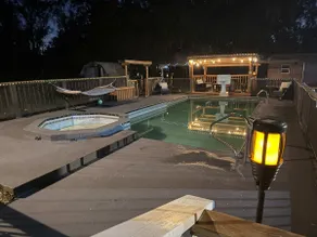 Farmhouse Oasis w Pool Heated Spa Treehouse and Game Room Located Centrally off I-4 - Image 2