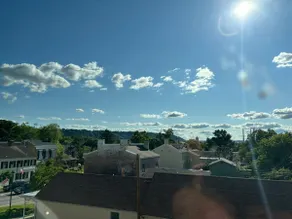 The Madison Inn, Sunset over the city Suite 201 - Image 2