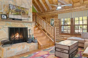 Log Cabin w/ Hot Tub & Waterfront Patio! - Image 3