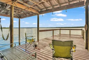 Lakefront Fishing Retreat | Dock & Canoe - Image 1