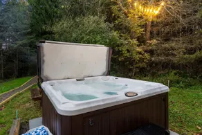 Luxury Log Chalet with Hot Tub, Games Room & Hill Views! - Image 4