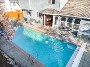 Stylish 4BR retreat with pool & year-round hot tub - Image 2
