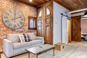 Hill Retreat: Rustic Charm w/ Balcony - Image 3
