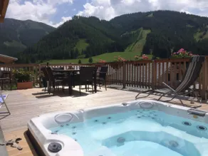 Elegant alpine chalet with sauna and hot tub - Image 3