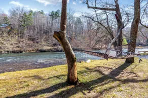Creekfront Cabin with Waterfall, Hot Tub, Fire Pit - Image 2