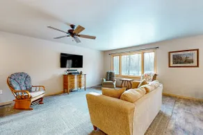 Cozy Tree-Lined Home Near Lakes & Trails - Image 2