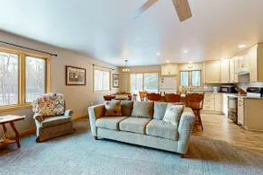 Cozy Tree-Lined Home Near Lakes & Trails - Image 3