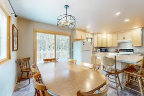 Cozy Tree-Lined Home Near Lakes & Trails - Image 5