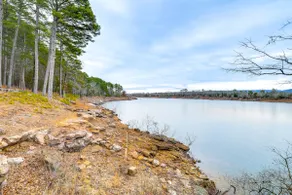 Deck & Fire Pit: Waterfront Cabin in Greers Ferry! - Image 2