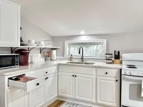 Quiet 2BR Getaway Near South County Beaches - Image 3