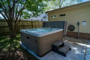 Cozy home near the Gathering Place with a hot tub - Image 3