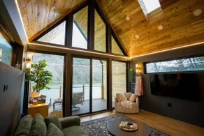 Riverfront Stylish Cabin w Firepit, Spa-Like Bath - Image 2