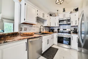 Luxury 4BR w/ King Bed | Fast Wi-Fi | Private Yard - Image 4