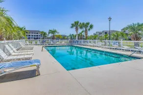 Balcony + Pool Access: Serene Little River Retreat - Image 3