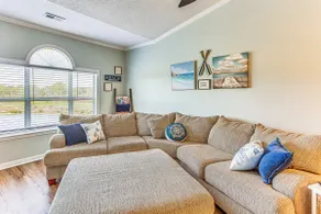 Balcony + Pool Access: Serene Little River Retreat - Image 4