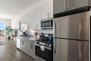 1BR City Loft With Modern Glass Views - Image 2
