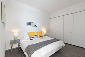 1BR City Loft With Modern Glass Views - Image 3