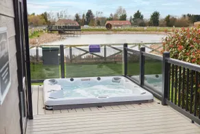 Deluxe Lakeside Chalet With Private Hot Tub - Image 2