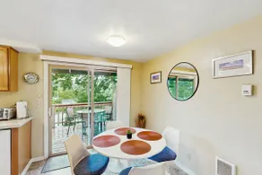 Upper level of duplex with a large deck & mountain - Image 5