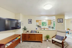 Upper level of duplex with a large deck & mountain - Image 3