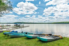 Lakefront Lodge with 100' sandy bottom/dock/firepi - Image 4