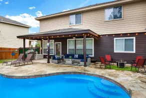 Spacious 5BR Retreat with Heated Pool & Outdoor Ga - Image 3