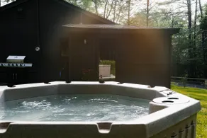 Stylish river town escape with hot tub + fire pit - Image 5