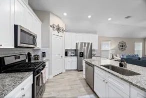Spacious 3BR Conroe Home Sleeps 12 with Fenced Yard & Games - Image 3