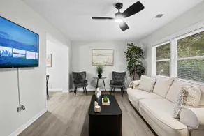 5 Min to Downtown | Smart TVs | Fast Wi-Fi - Image 5