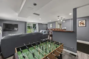 The Reel Retreat | Theatre & Firepit • Game Room - Image 2