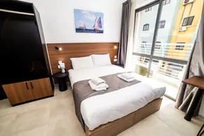 Premium Studio Apartment near Green Park by HostMT - Image 4