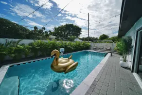 5 Min to Beach Heated Pool HotTub 85”TVs BBQ Games - Image 2