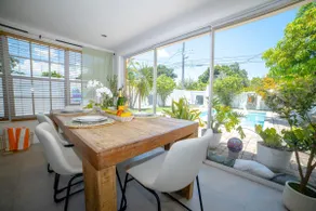 Mango Villa | Stylish Family Retreat, Heated Pool - Image 3